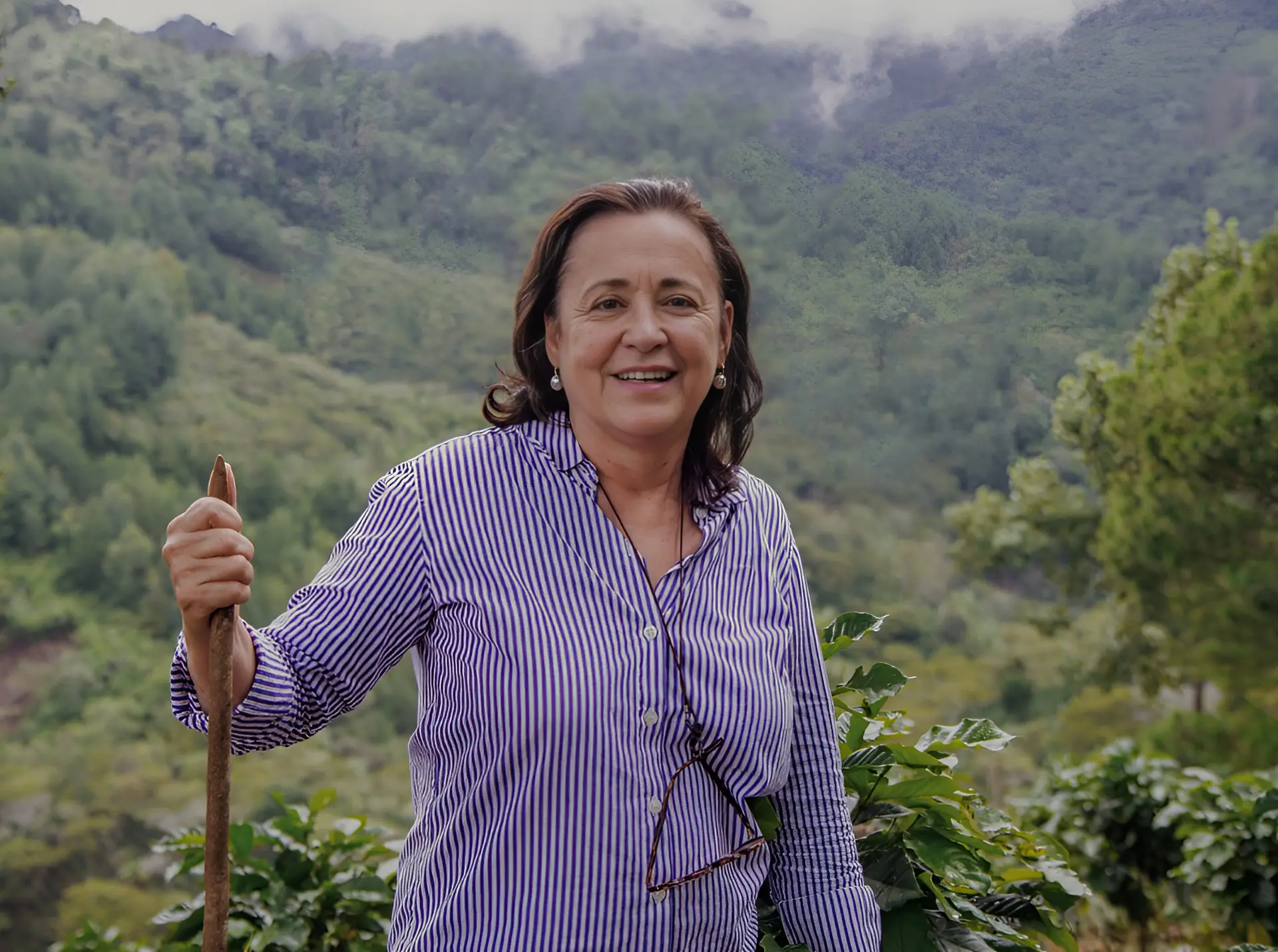 A photo of Ana Maria Albir with the mountains of Nicaragua in the background